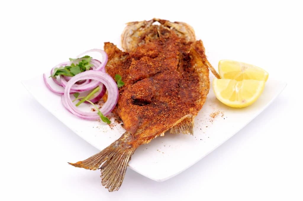 Authentic Afghan Fried Fish — Fresh fish marinated in Afghan spices and pan-fried to a cri...