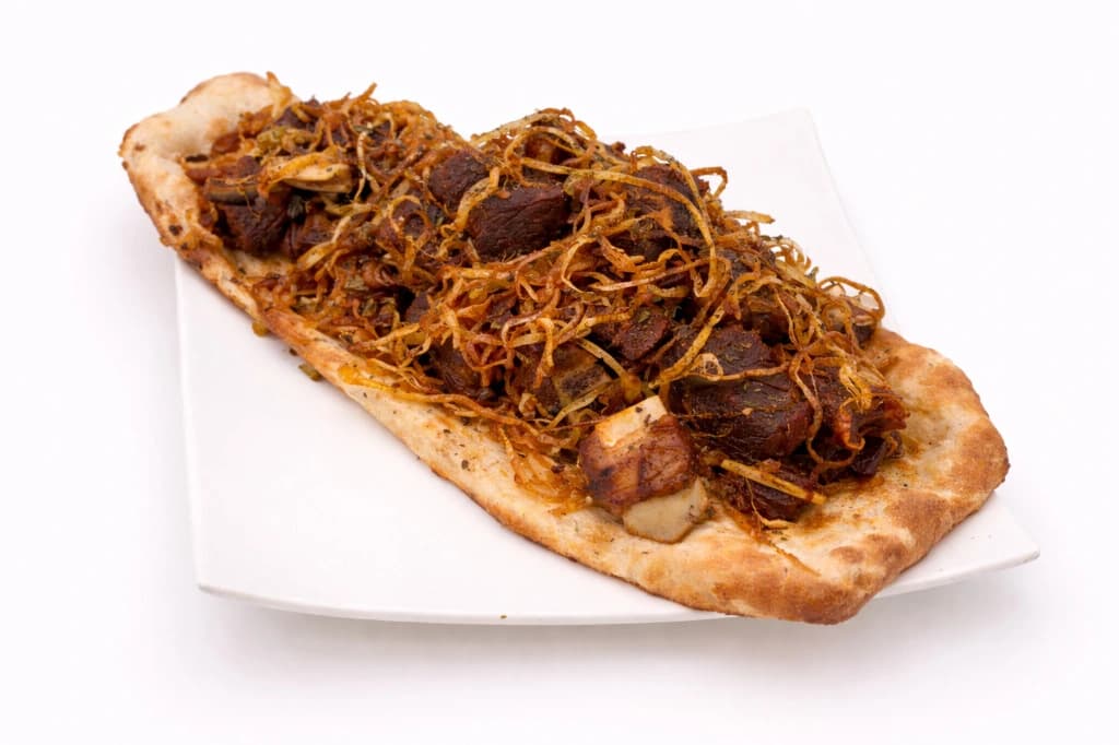 Authentic Afghan Qawr Dagh — A rich, traditional Jowzjan meat dish slow-cooked in its own...