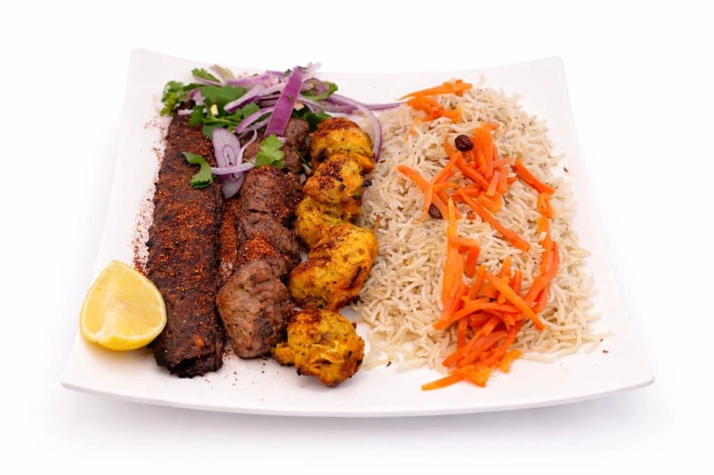 Authentic Afghan Super Combo — A combination of lamb, shami, and chicken served with rice, ...